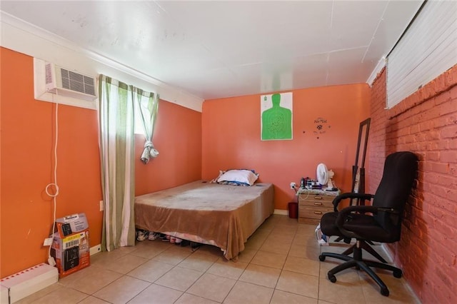 4529 Citrus Dr, New Orleans, LA 70127 - bedroom featuring brick wall, light tile patterned floors, baseboard heating, and a wall unit AC