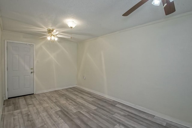 7984 Edgelake Ct, New Orleans, LA 70126 - spare room featuring ceiling fan, wood finished floors, and a textured ceiling