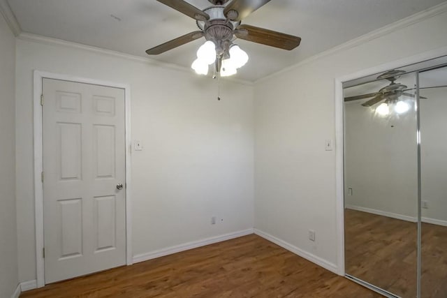 7984 Edgelake Ct, New Orleans, LA 70126 - spare room featuring wood finished floors, baseboards, ornamental molding, and ceiling fan