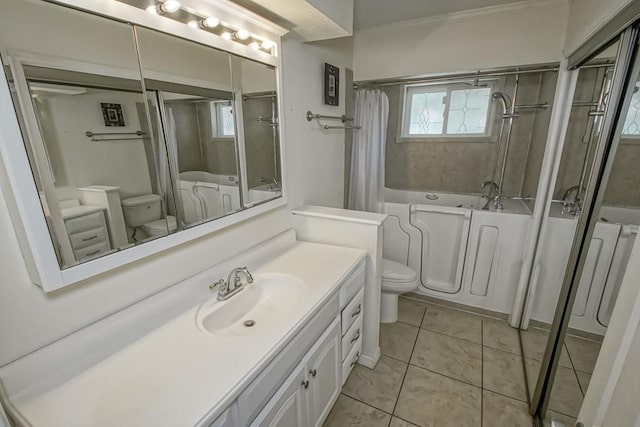 7984 Edgelake Ct, New Orleans, LA 70126 - bathroom with tile patterned floors, vanity, crown molding, and toilet
