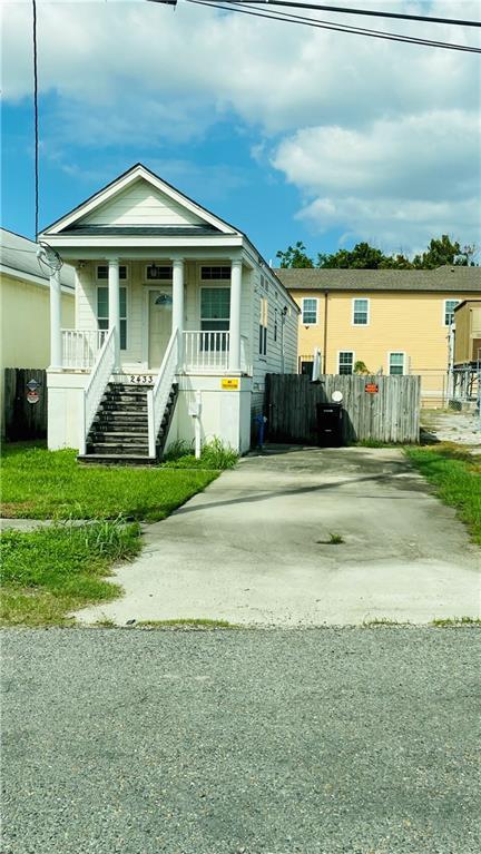 2433 Perdido St, New Orleans, LA 70119 - view of front of property with stairway and covered porch