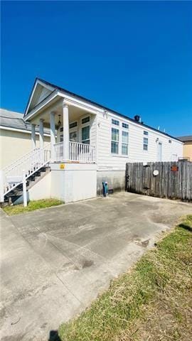 2433 Perdido St, New Orleans, LA 70119 - view of home's exterior with a porch and stairs
