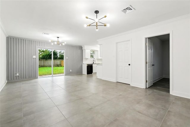 4904 Argonne St, Metairie, LA 70001 - unfurnished living room with a chandelier, crown molding, baseboards, and a sink