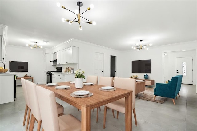 4904 Argonne St, Metairie, LA 70001 - dining room with a chandelier, ornamental molding, and light tile patterned floors