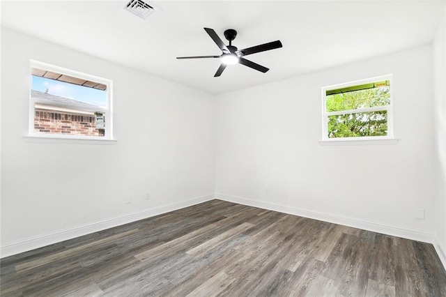 4904 Argonne St, Metairie, LA 70001 - spare room featuring wood finished floors, baseboards, and a ceiling fan