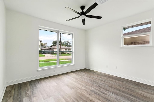 4904 Argonne St, Metairie, LA 70001 - unfurnished room with wood finished floors, baseboards, and ceiling fan