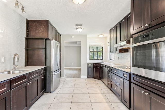 238 Blue Crane 1 Dr, Slidell, LA 70461 - kitchen with visible vents, stainless steel appliances, under cabinet range hood, a sink, and open shelves