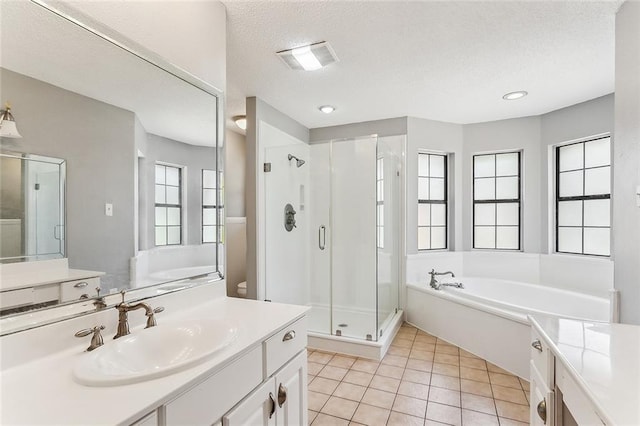 238 Blue Crane 1 Dr, Slidell, LA 70461 - full bath with a textured ceiling, a stall shower, a garden tub, and visible vents