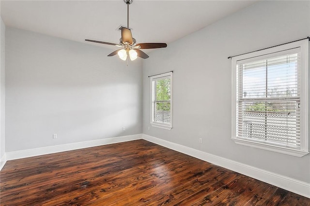 6309 Debore Dr, New Orleans, LA 70126 - spare room featuring dark wood-type flooring, baseboards, and ceiling fan