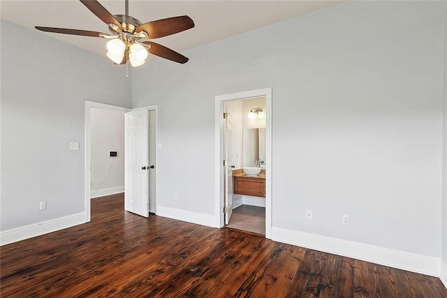 6309 Debore Dr, New Orleans, LA 70126 - unfurnished bedroom featuring a sink, a ceiling fan, ensuite bathroom, baseboards, and dark wood-type flooring