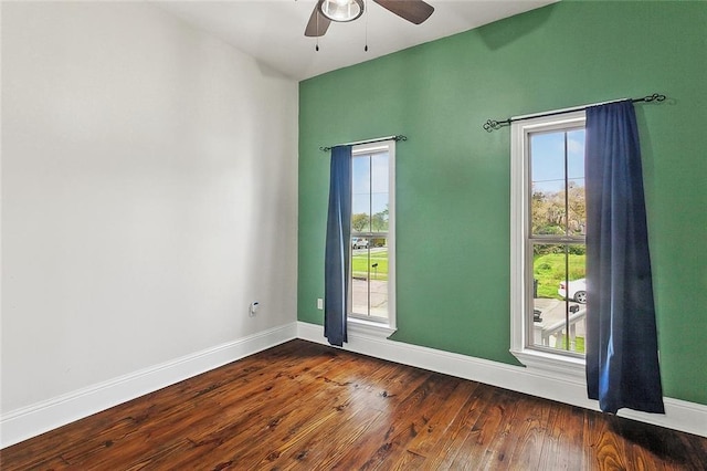 6309 Debore Dr, New Orleans, LA 70126 - unfurnished room with a wealth of natural light, baseboards, and dark wood-style floors