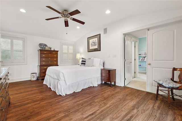 107 Stella St, Metairie, LA 70005 - bedroom with dark wood-style flooring, multiple windows, lofted ceiling, recessed lighting, and baseboards