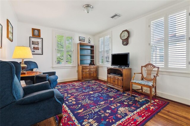 107 Stella St, Metairie, LA 70005 - living room with wood finished floors and baseboards