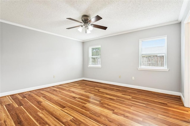 803 Lake Dcote Ct, Slidell, LA 70461 - unfurnished room with crown molding, a textured ceiling, wood finished floors, and ceiling fan