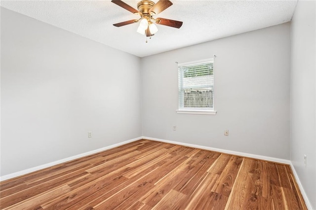 803 Lake Dcote Ct, Slidell, LA 70461 - spare room featuring wood finished floors, a ceiling fan, and a textured ceiling