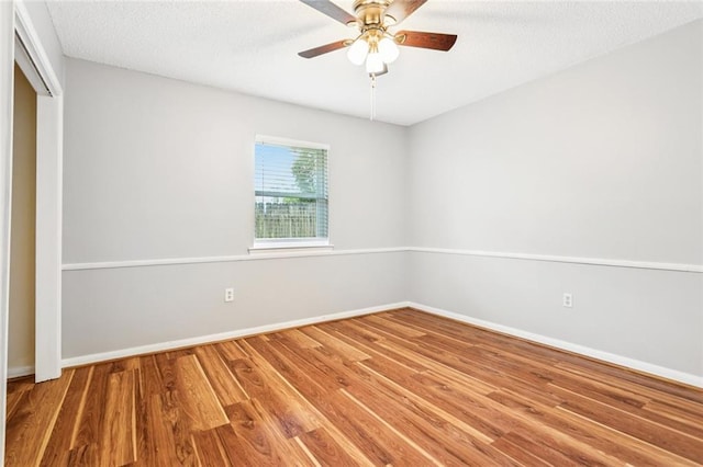 803 Lake Dcote Ct, Slidell, LA 70461 - empty room with wood finished floors and a ceiling fan