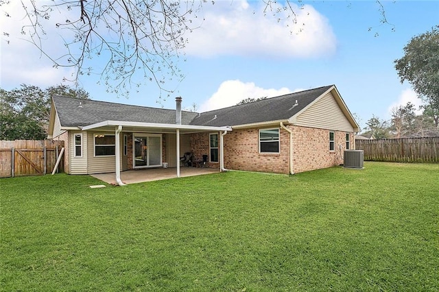 803 Lake Dcote Ct, Slidell, LA 70461 - back of property featuring central air condition unit, a patio, and brick siding