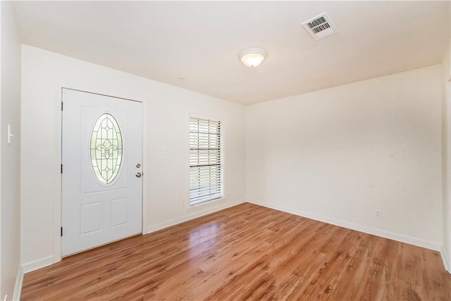 17168 E Little Italy Rd, Hammond, LA 70403 - foyer entrance featuring baseboards, visible vents, and light wood-type flooring
