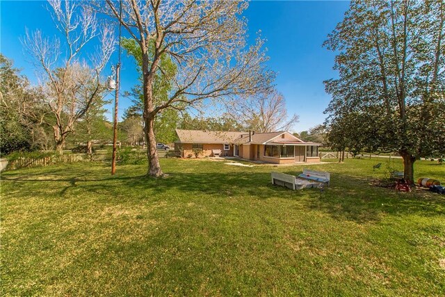 17168 E Little Italy Rd, Hammond, LA 70403 - view of yard featuring a sunroom