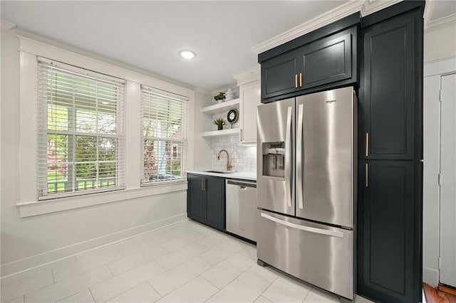 2108 Cherrydale Ave, Baton Rouge, LA 70808 - kitchen featuring light countertops, open shelves, decorative backsplash, a sink, and appliances with stainless steel finishes