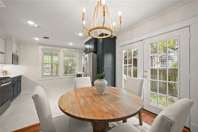 2108 Cherrydale Ave, Baton Rouge, LA 70808 - dining space with recessed lighting, crown molding, a chandelier, and visible vents