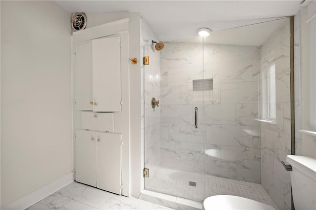 2108 Cherrydale Ave, Baton Rouge, LA 70808 - bathroom featuring a marble finish shower, marble finish floor, toilet, and baseboards