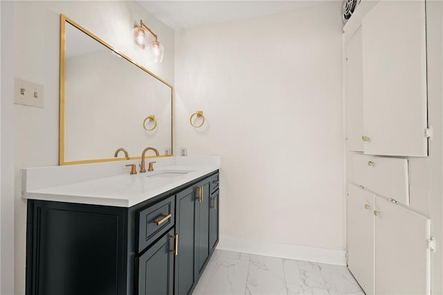 2108 Cherrydale Ave, Baton Rouge, LA 70808 - bathroom featuring marble finish floor, vanity, and baseboards