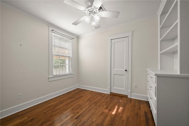 2108 Cherrydale Ave, Baton Rouge, LA 70808 - empty room with dark wood-style flooring, crown molding, baseboards, and ceiling fan