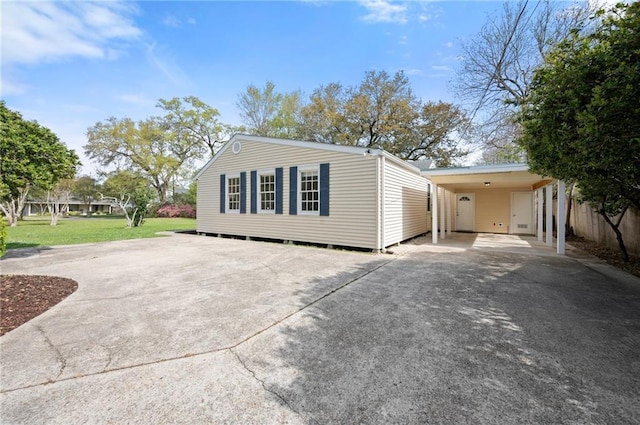 2108 Cherrydale Ave, Baton Rouge, LA 70808 - exterior space with a front lawn, concrete driveway, and a carport