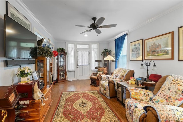 living room featuring a ceiling fan, crown molding, hardwood / wood-style floors, and recessed lighting