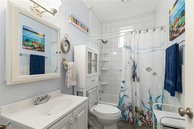 full bath with shower / bath combo, vanity, and toilet