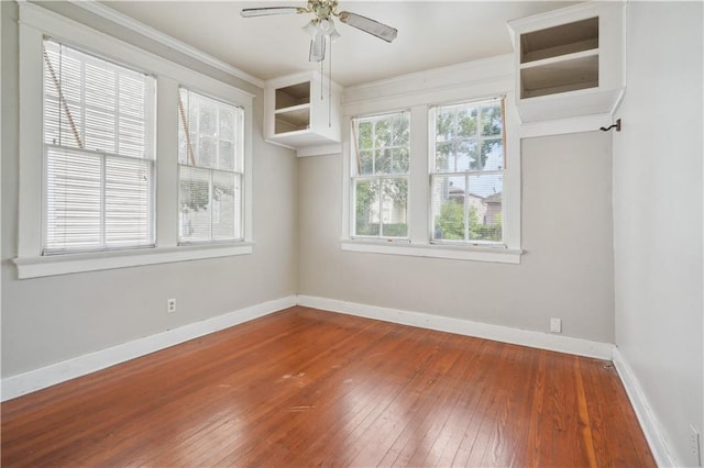 441921 Fontainebleau Dr, New Orleans, LA 70125 - unfurnished room featuring baseboards, a ceiling fan, and wood-type flooring