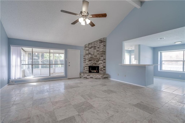 2260 Killington Dr, Harvey, LA 70058 - unfurnished living room featuring baseboards, a fireplace, ceiling fan, and a textured ceiling