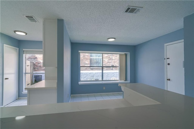 2260 Killington Dr, Harvey, LA 70058 - bathroom featuring tile patterned floors, a wealth of natural light, and visible vents