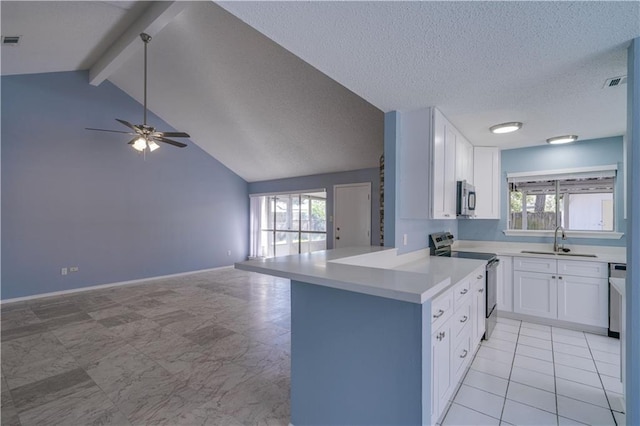2260 Killington Dr, Harvey, LA 70058 - kitchen with open floor plan, light countertops, a sink, ceiling fan, and appliances with stainless steel finishes