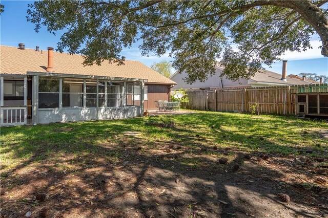 2260 Killington Dr, Harvey, LA 70058 - view of yard with a sunroom and fence