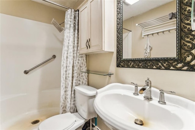 230 Evella Dr, Slidell, LA 70458 - full bath with toilet, a shower with curtain, and a sink