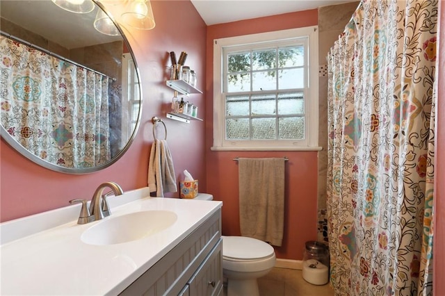 3701 Marigny St, New Orleans, LA 70122 - bathroom featuring toilet, tile patterned floors, a shower with shower curtain, and vanity