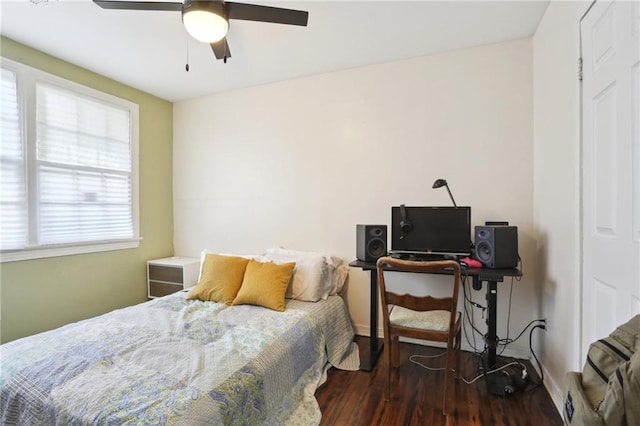 3701 Marigny St, New Orleans, LA 70122 - bedroom with baseboards, wood finished floors, and ceiling fan