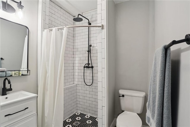 3701 Marigny St, New Orleans, LA 70122 - bathroom with toilet, vanity, and a stall shower