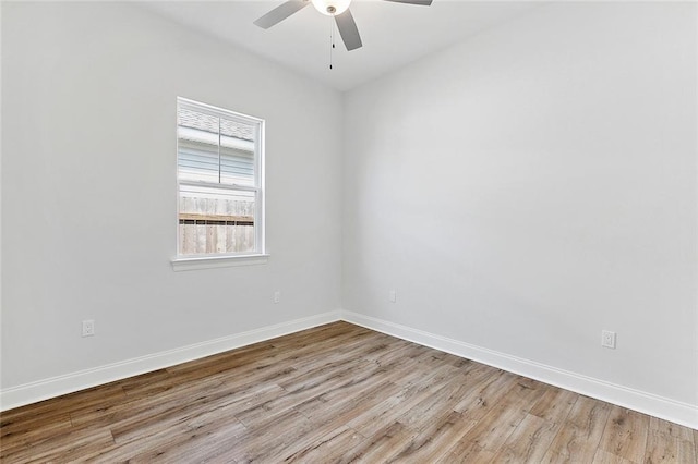 4720 Cross St, Jefferson, LA 70121 - unfurnished room with wood finished floors, a ceiling fan, and baseboards
