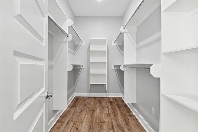 4720 Cross St, Jefferson, LA 70121 - walk in closet featuring wood finished floors