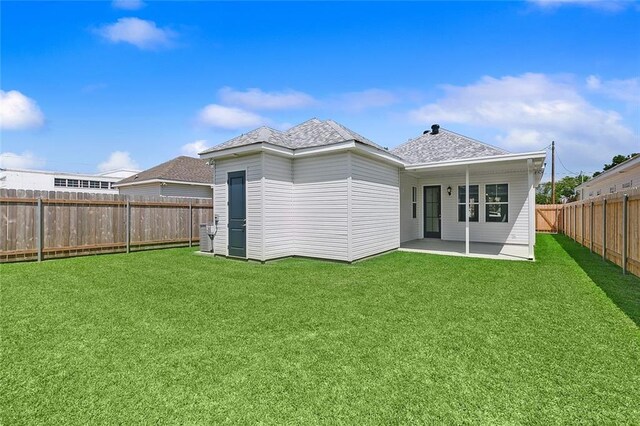 4720 Cross St, Jefferson, LA 70121 - back of house with a patio and roof with shingles