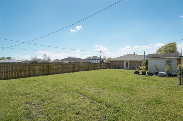 view of yard featuring fence