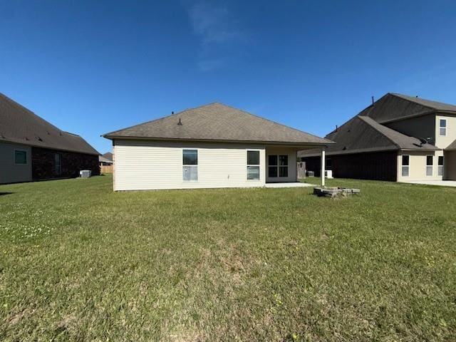 17657 Golden Eagle Dr, Prairieville, LA 70769 - rear view of house featuring a yard