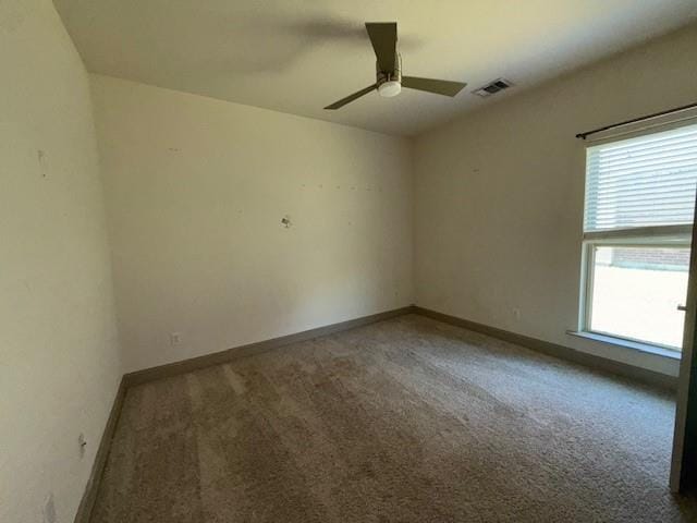 17657 Golden Eagle Dr, Prairieville, LA 70769 - carpeted spare room with baseboards, visible vents, and ceiling fan