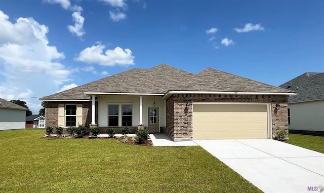 129 Olivia Dr, Luling, LA 70070 - view of front of home featuring brick siding, an attached garage, concrete driveway, a front lawn, and a shingled roof