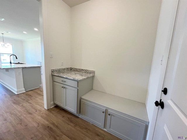 129 Olivia Dr, Luling, LA 70070 - mudroom with wood finished floors, a chandelier, and recessed lighting