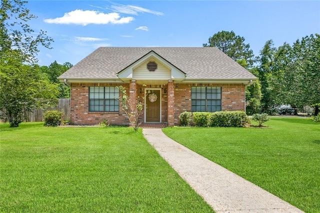 65398 Maple St, Mandeville, LA 70448 - view of front facade featuring brick siding and roof with shingles