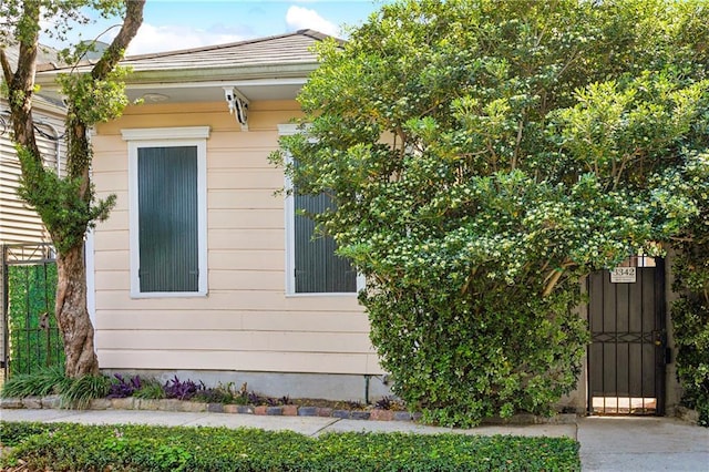 3342 Bell St, New Orleans, LA 70119 - view of side of home featuring a gate